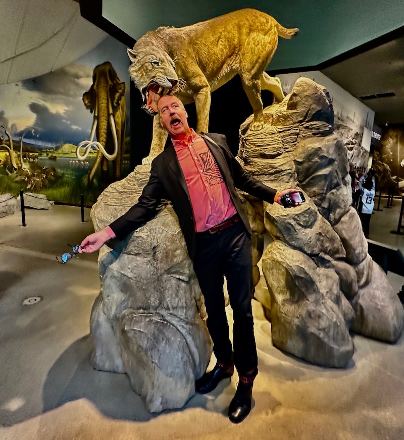 Krist with sabertooth tiger figure.